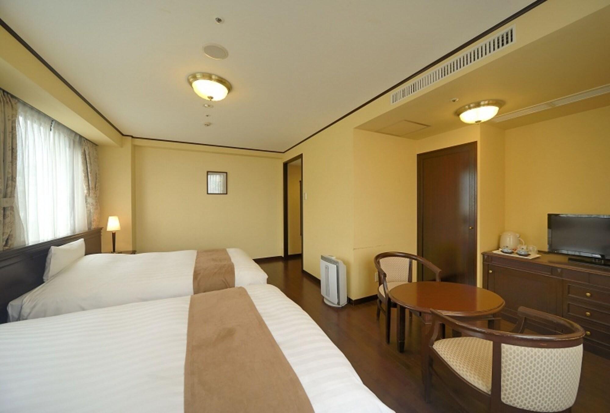 อมามี ซันพลาซ่า โฮเต็ล Hotel อามามิ ภายนอก รูปภาพ