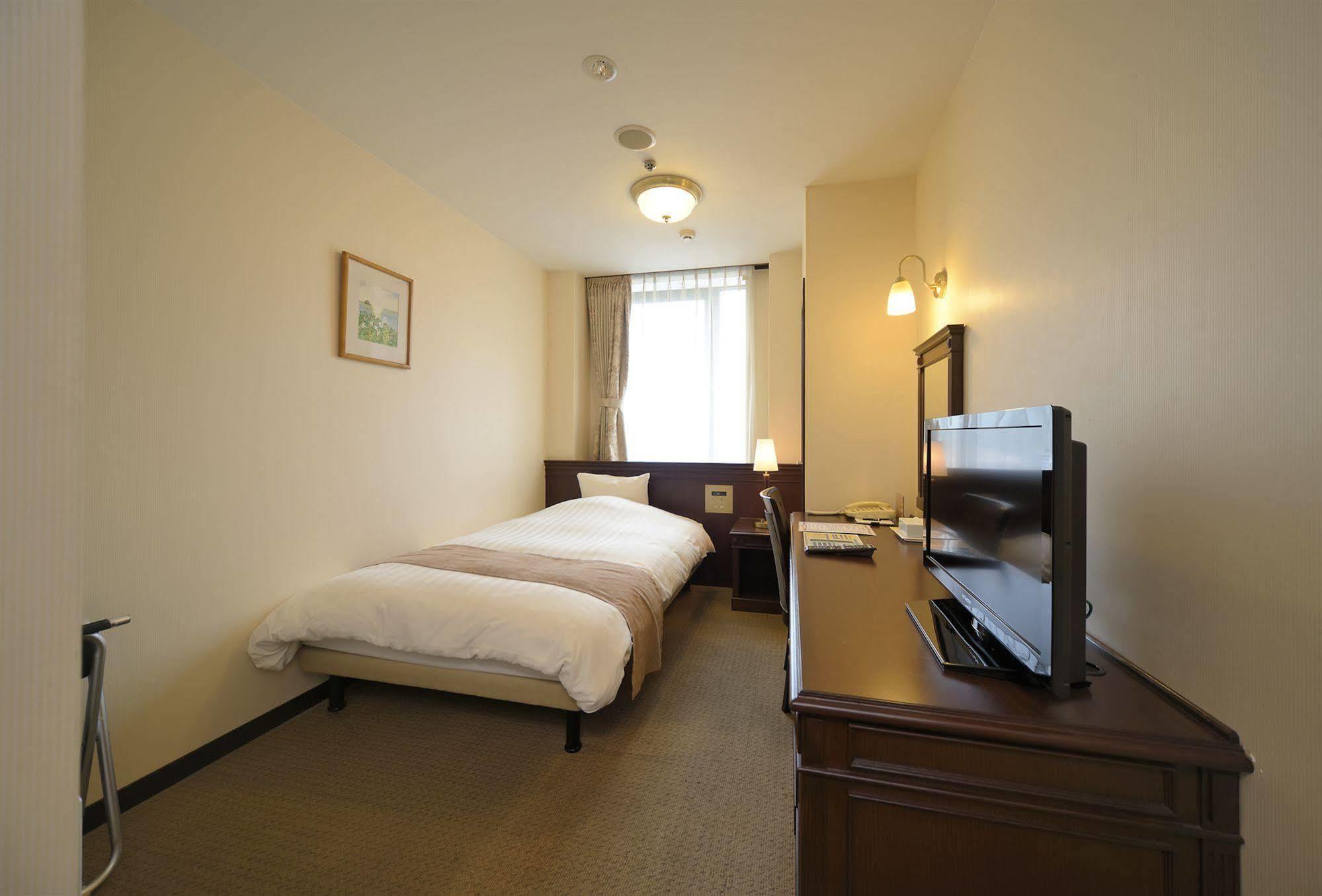 อมามี ซันพลาซ่า โฮเต็ล Hotel อามามิ ภายนอก รูปภาพ