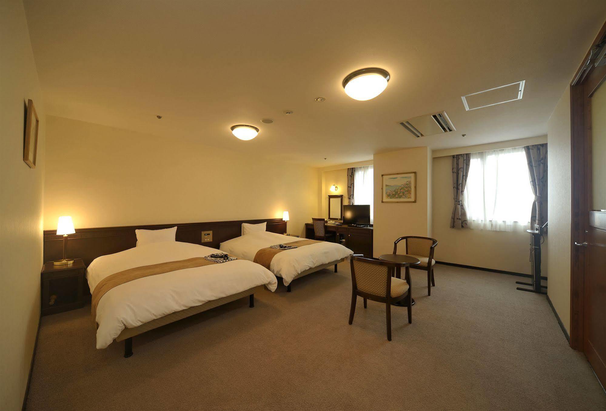 อมามี ซันพลาซ่า โฮเต็ล Hotel อามามิ ภายนอก รูปภาพ