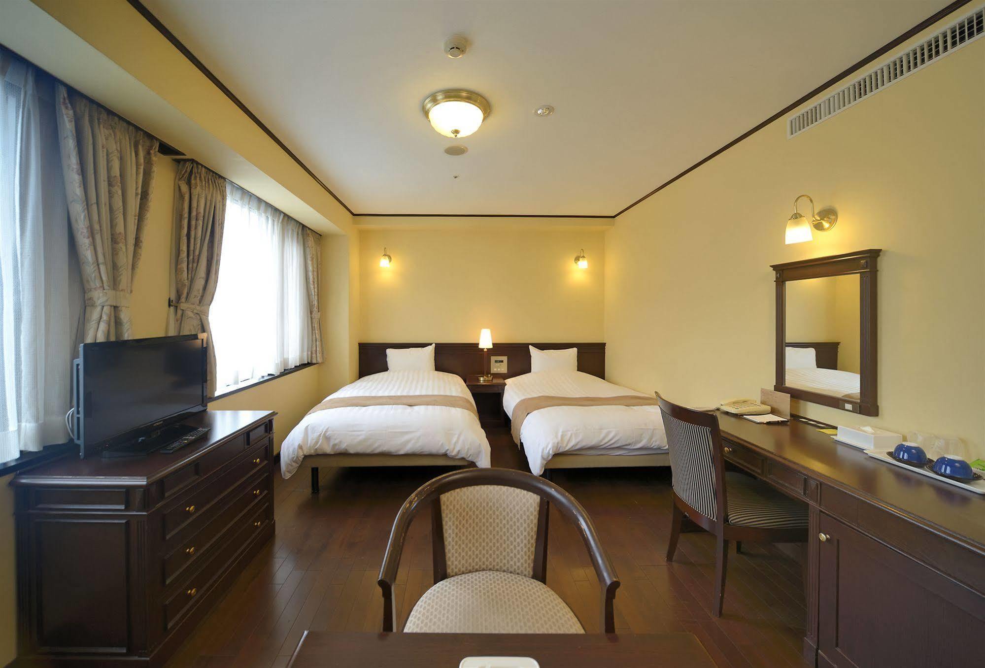 อมามี ซันพลาซ่า โฮเต็ล Hotel อามามิ ภายนอก รูปภาพ