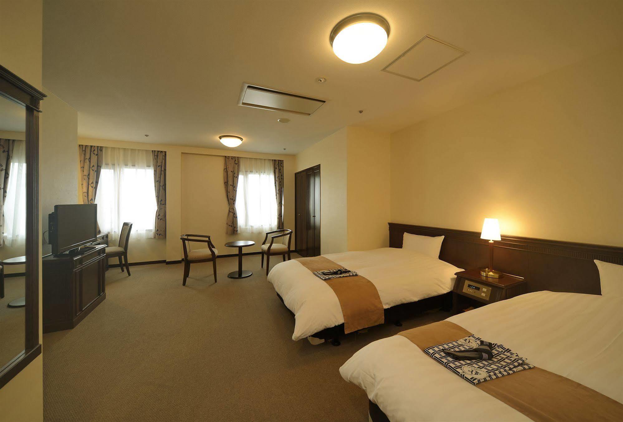 อมามี ซันพลาซ่า โฮเต็ล Hotel อามามิ ภายนอก รูปภาพ