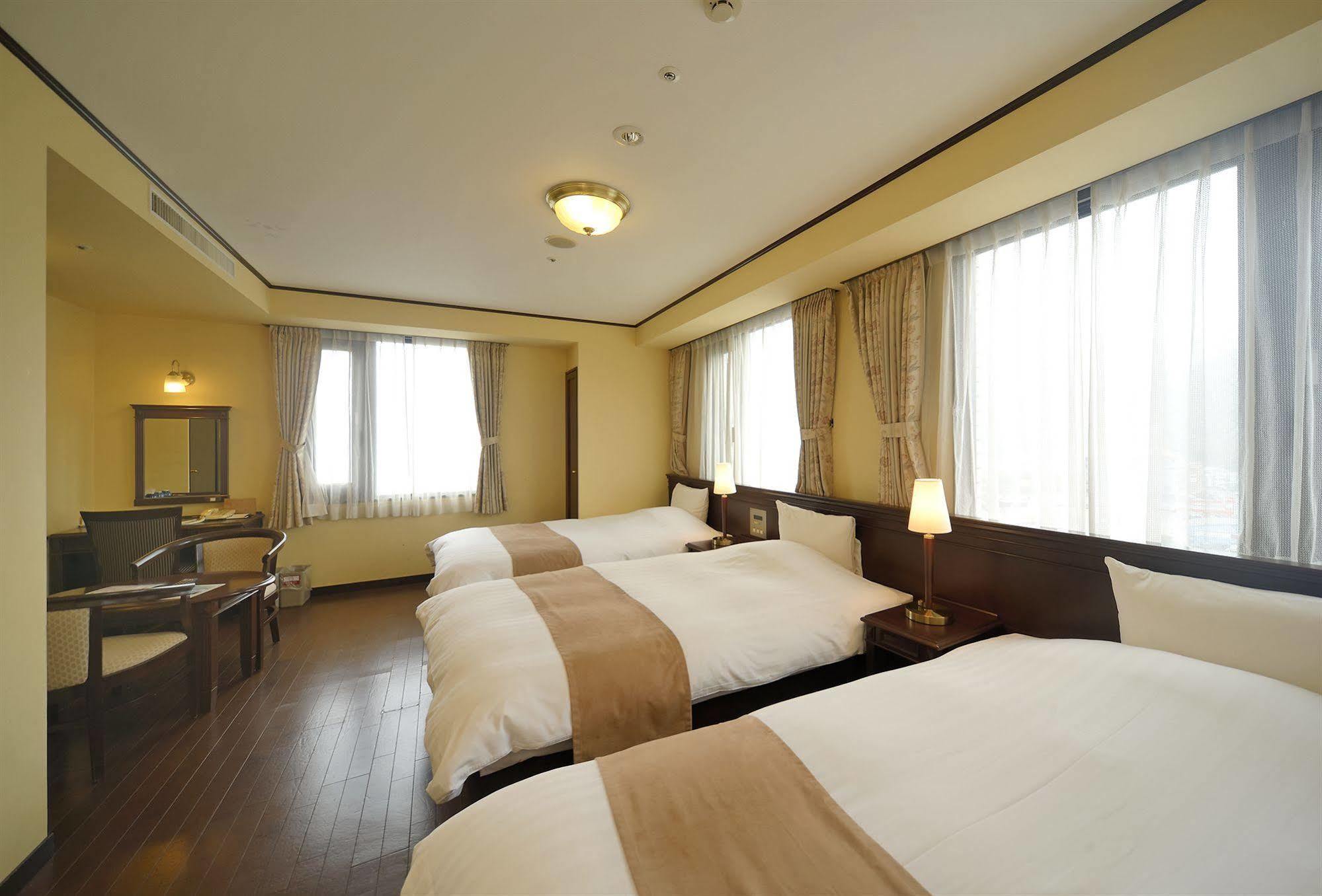 อมามี ซันพลาซ่า โฮเต็ล Hotel อามามิ ภายนอก รูปภาพ