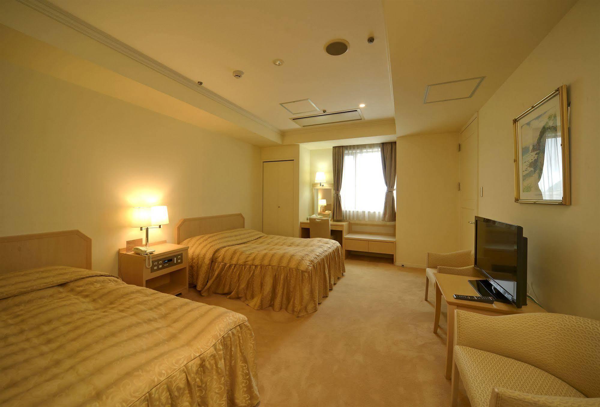 อมามี ซันพลาซ่า โฮเต็ล Hotel อามามิ ภายนอก รูปภาพ